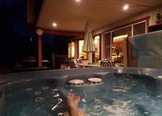 POV enjoying spa at night